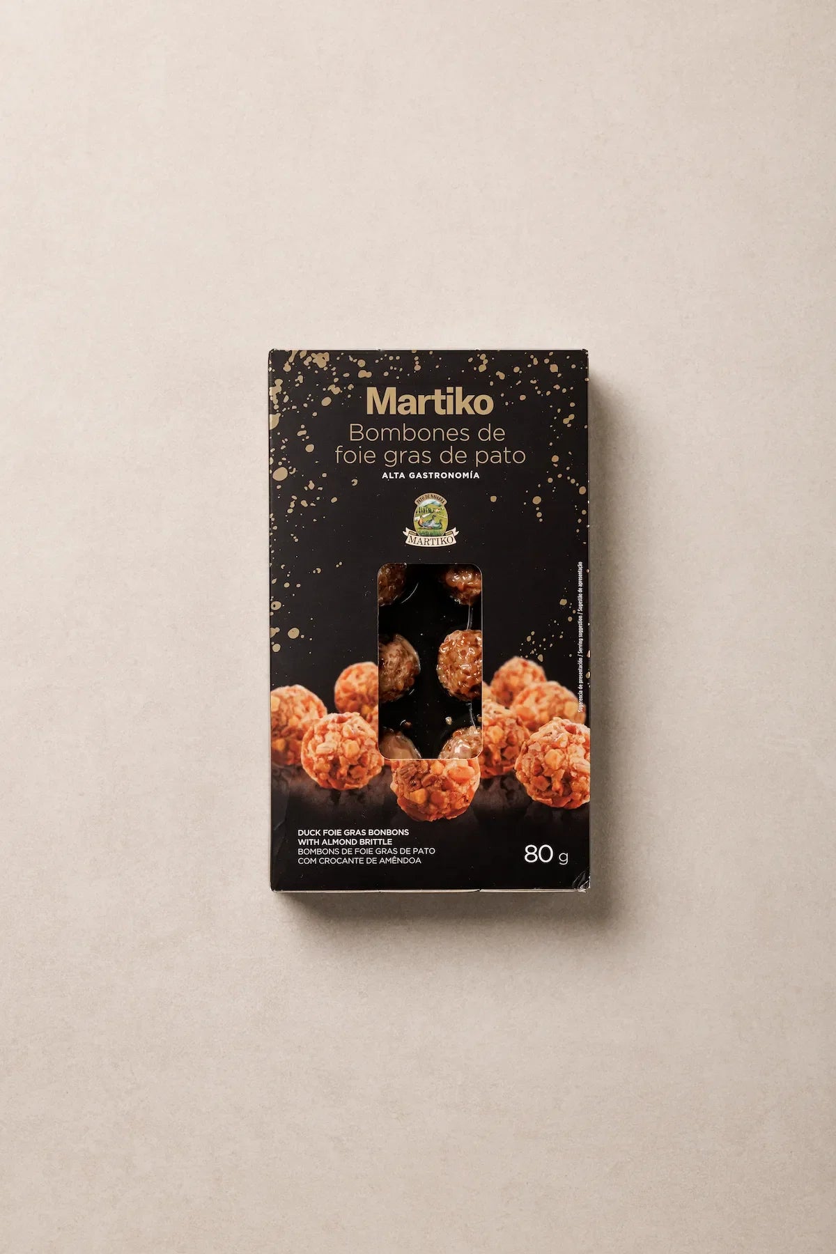 Lo que llega a casa: bombones de foie gras de pato y almendra crocanti en su caja