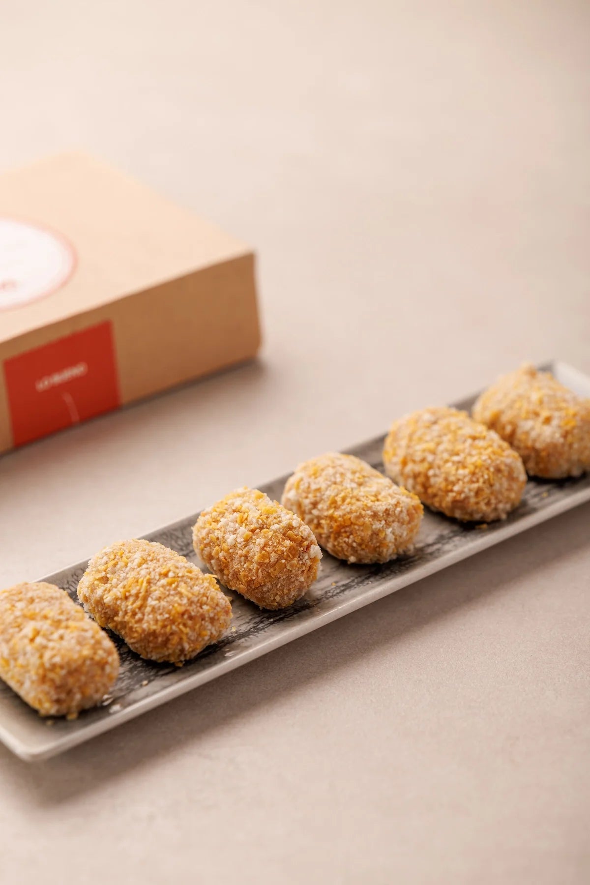 Lo que llega a casa: croquetas cremosas de jamón ibérico en panko, con su caja de SAGÓ