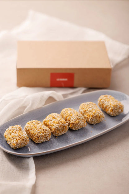 Lo que llega a casa: croquetas cremosas de puchero en panko, con su caja de SAGÓ
