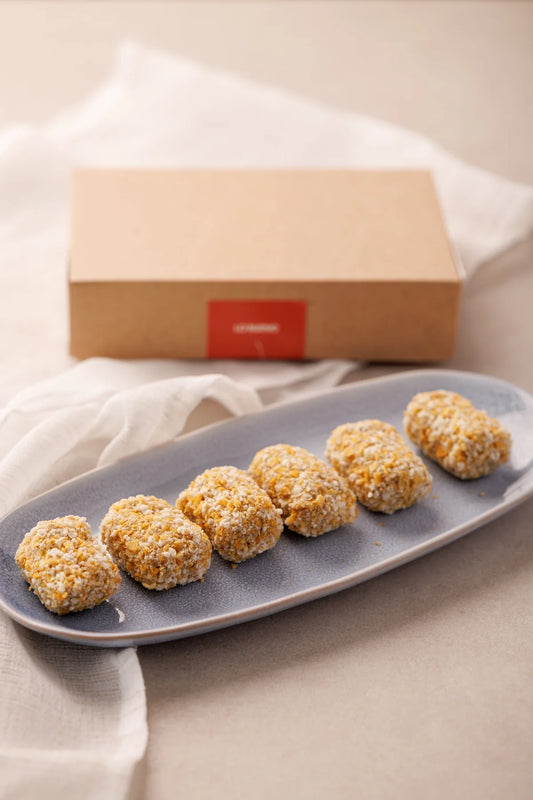 Lo que llega a casa: croquetas cremosas de puchero en panko, con su caja de SAGÓ